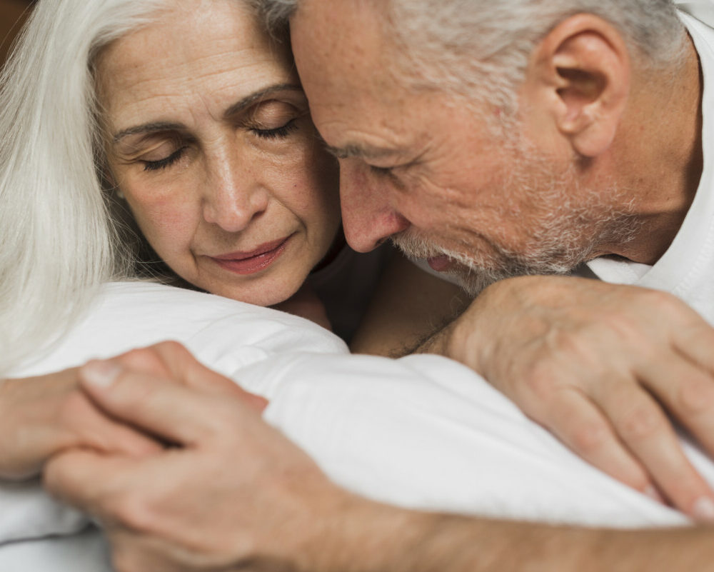 close-up-senior-couple-holding-hands