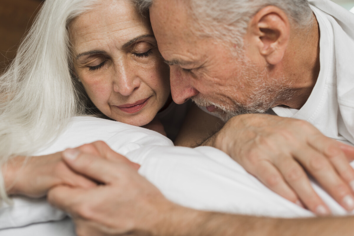 close-up-senior-couple-holding-hands