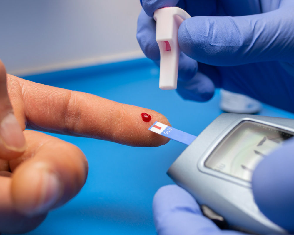 closeup-shot-doctor-with-rubber-gloves-taking-blood-test-from-patient