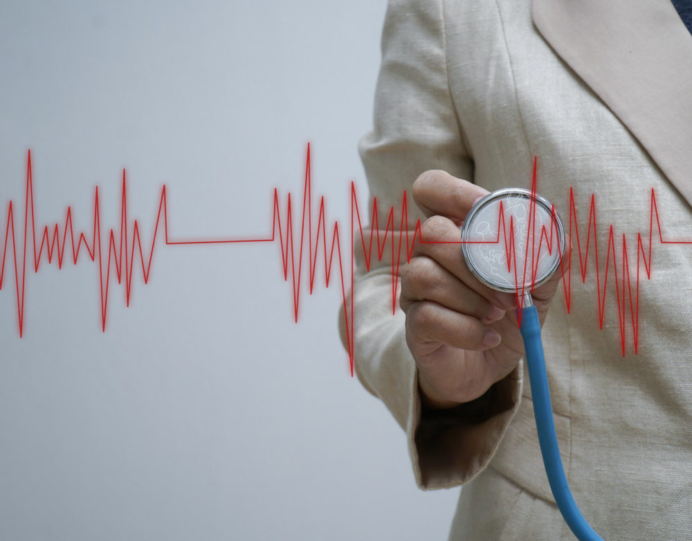 doctor-hand-with-stethoscope-listening-heartbeat