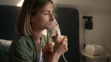 side-view-woman-using-nebulizer