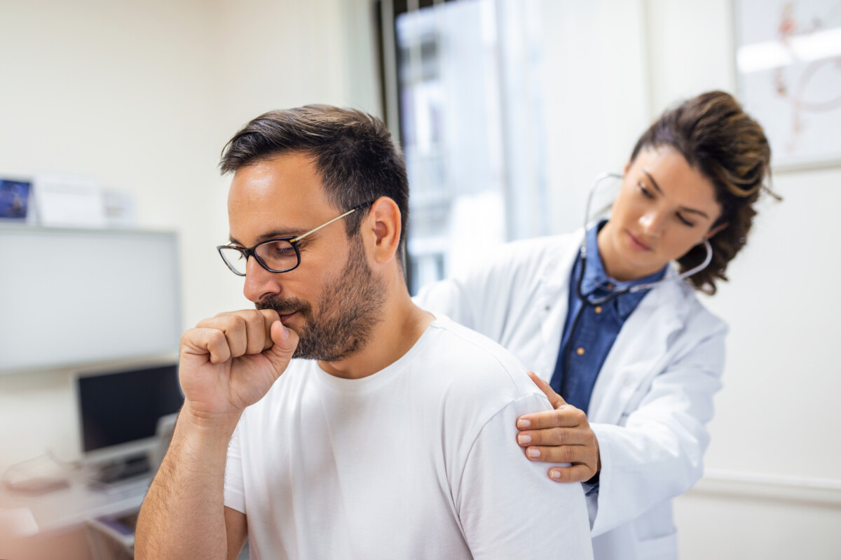 female-doctor-clinic-performs-auscultation-lungs-patient-with-symptoms-coronavirus-pneumonia