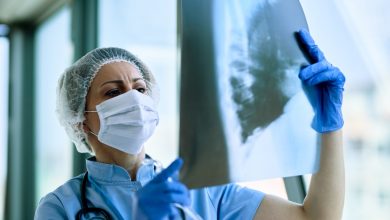 female-radiologist-analyzing-chest-xray-patient-medical-clinic-during-coronavirus-epidemic-pneumonie