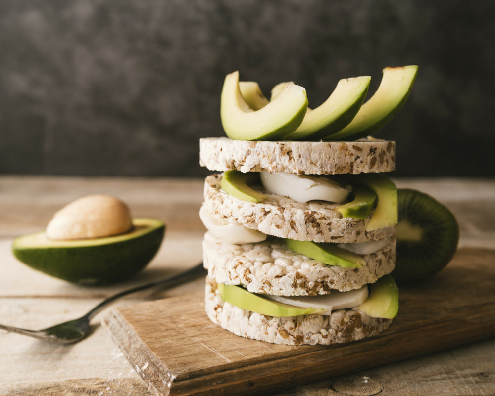 front-view-avocado-breakfast-with-blurred-background